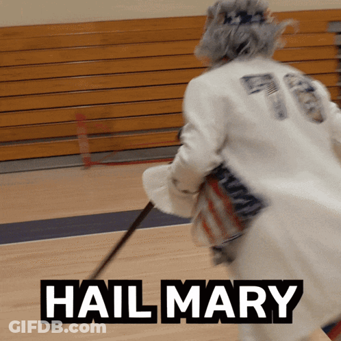 Hockey Player Holding Stick With Hail Mary GIF