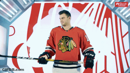Hockey Player Holding Stick With Sportsnet Chicago Logo GIF