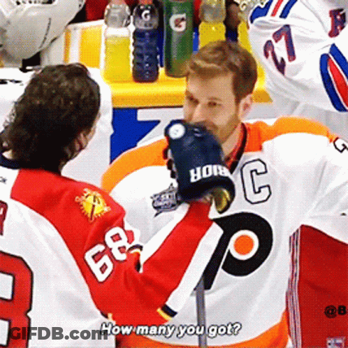 Hockey Player In 68 Jersey Talking To Another GIF