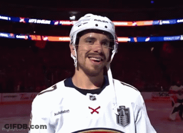 Hockey Player In Bauer Helmet And White Jersey GIF