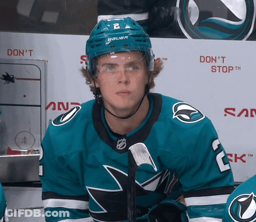 Hockey Player In Bauer Helmet Looking At Camera GIF