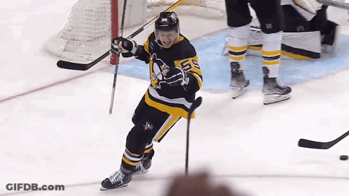 Hockey Player In Black And Yellow Jersey Number 5 GIF