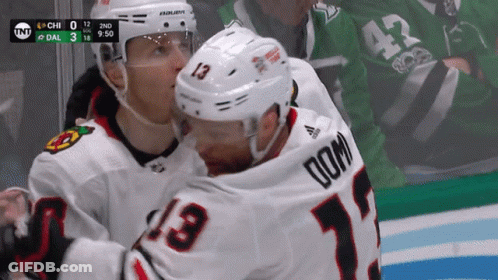 Hockey Player In Black Coca Sports Jersey GIF
