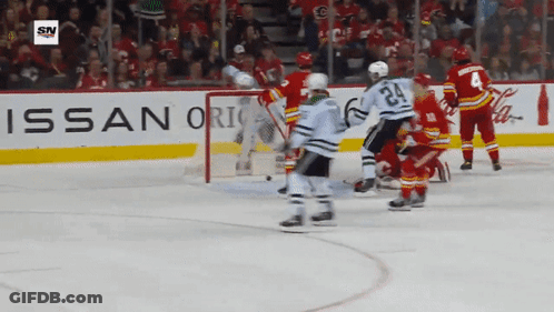 Hockey Player In Black Helmet Number 21 GIF