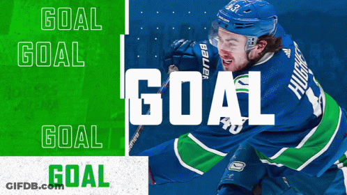 Hockey Player In Blue And Green Jersey With Goal GIF