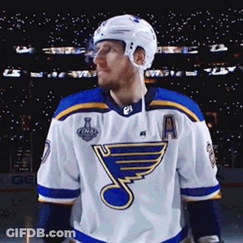 Hockey Player In Blue And White Jersey With Letter A On Ice GIF