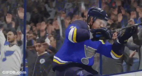 Hockey Player In Blue And Yellow Jersey GIF