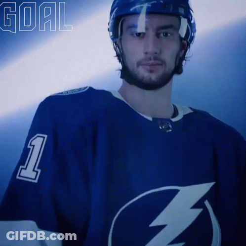 Hockey Player In Blue Jersey Number 1 GIF