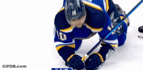 Hockey Player In Blue Jersey Number 10 GIF
