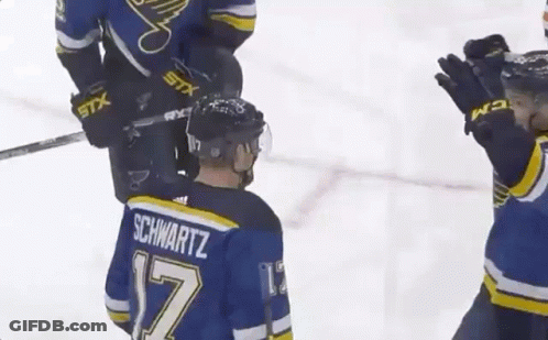 Hockey Player In Blue Jersey Number 17 GIF
