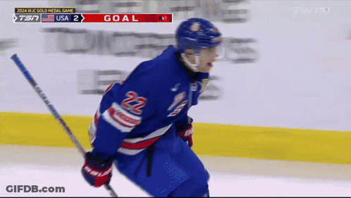 Hockey Player In Blue Jersey Number 22 GIF