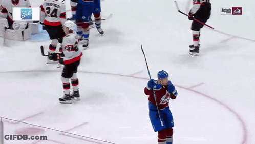 Hockey Player In Blue Jersey Number 23 GIF