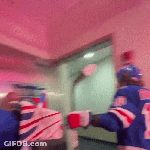Hockey Player In Blue Jersey Number 24 GIF