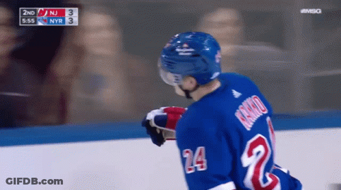 Hockey Player In Blue Jersey Number 24 GIF