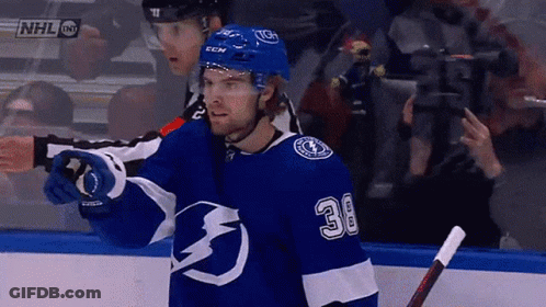 Hockey Player In Blue Jersey Number 30 GIF