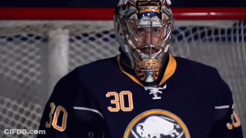 Hockey Player In Blue Jersey Number 30 GIF