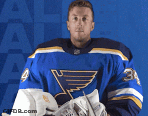 Hockey Player In Blue Jersey Number 34 GIF