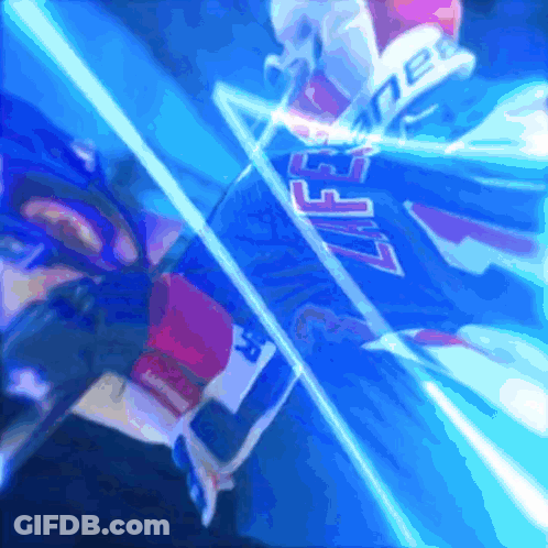 Hockey Player In Blue Jersey Number 37 GIF