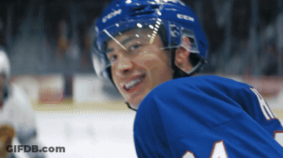 Hockey Player In Blue Jersey Number 4 GIF