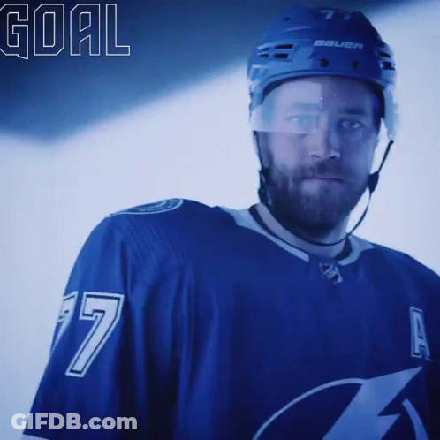 Hockey Player In Blue Jersey Number 7 GIF