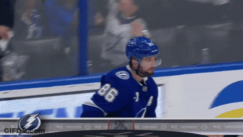Hockey Player In Blue Jersey Number 8 GIF