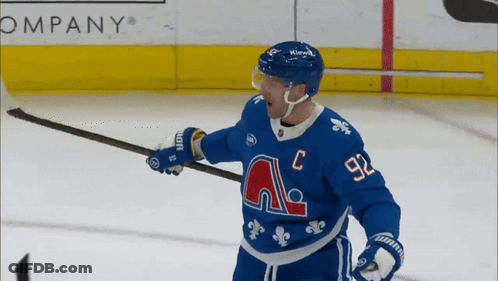 Hockey Player In Blue Jersey Number 92 GIF