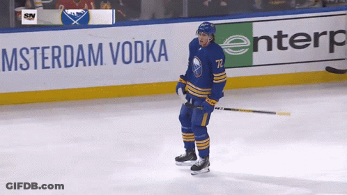 Hockey Player In Front Of Amsterdam Vodka GIF