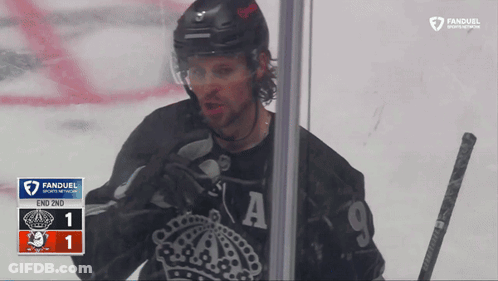 Hockey Player In Front Of Fanduel Scoreboard GIF