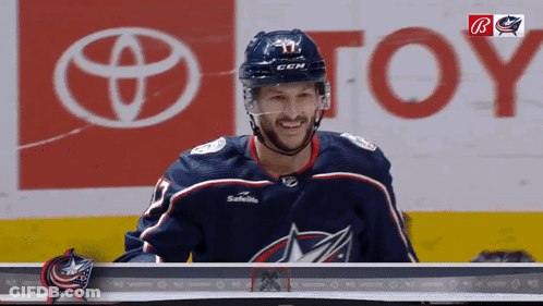 Hockey Player In Front Of Toyota Ad GIF