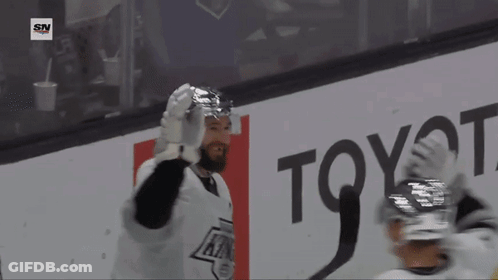 Hockey Player In Front Of Toyota Advertisement GIF