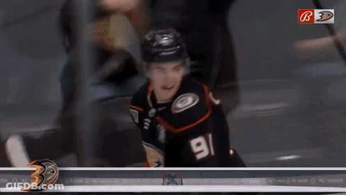 Hockey Player In Front Of Victory Sign GIF