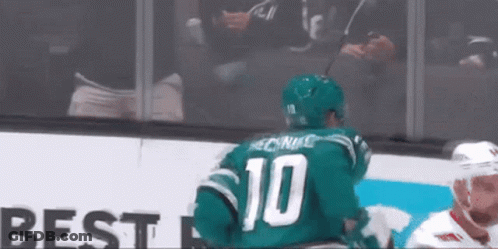 Hockey Player In Green Jersey Number 10 GIF