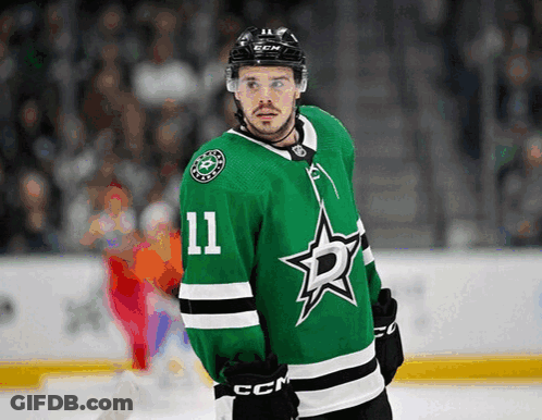 Hockey Player In Green Jersey Number 11 GIF