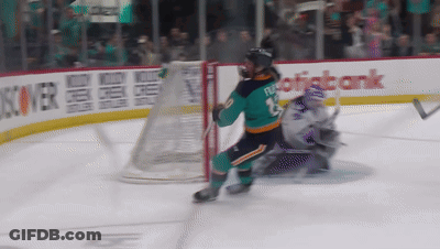 Hockey Player In Green Jersey Number 13 GIF