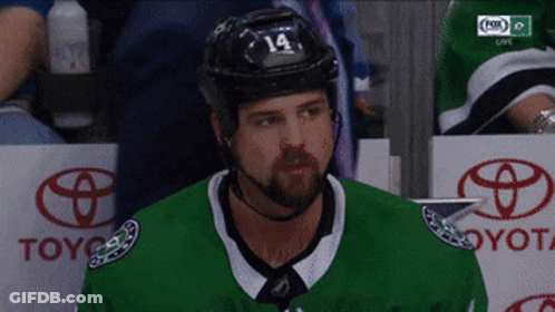 Hockey Player In Green Jersey Number 14 GIF