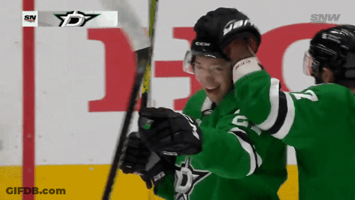 Hockey Player In Green Jersey Number 2 GIF