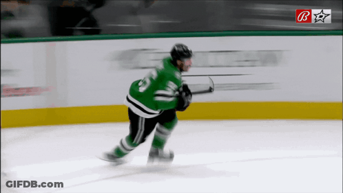 Hockey Player In Green Jersey Number 23 GIF