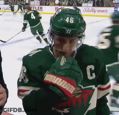 Hockey Player In Green Jersey Number 46 GIF