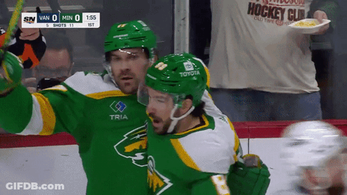 Hockey Player In Green Jersey Tria GIF