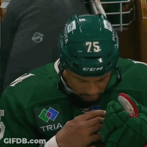Hockey Player In Green Jersey With M GIF
