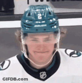 Hockey Player In Helmet Number 2 Smiling GIF
