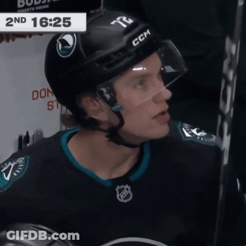 Hockey Player In Helmet Number 72 GIF