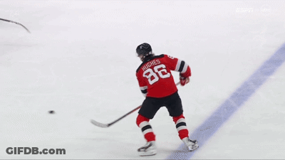 Hockey Player In Jersey 36 Skating On Ice GIF