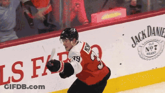 Hockey Player In Jersey Number 19 GIF