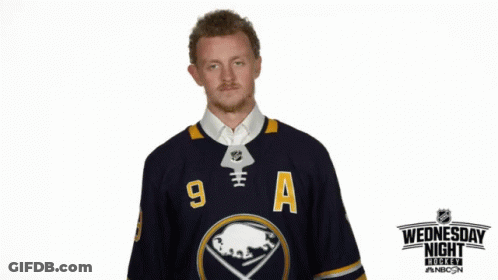 Hockey Player In Jersey Saying 9 A GIF