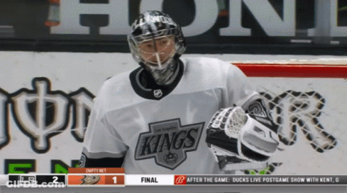 Hockey Player In Kings Jersey With Scoreboard GIF