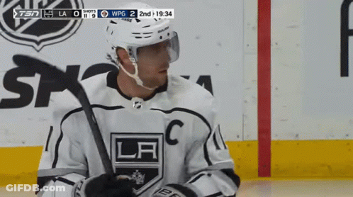 Hockey Player In LA Jersey Holding Stick GIF