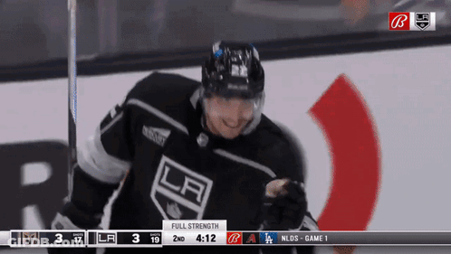 Hockey Player In LA Jersey Holding Stick GIF