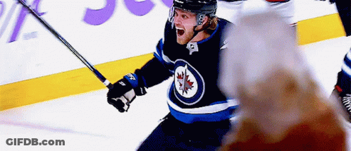 Hockey Player In Maple Leaf Jersey Celebrating Goal GIF