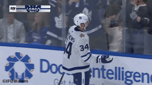 Hockey Player In Number 34 Jersey On Ice GIF
